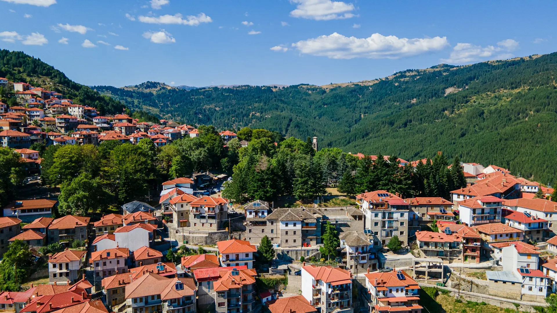 An aerial view of a village in the mountains