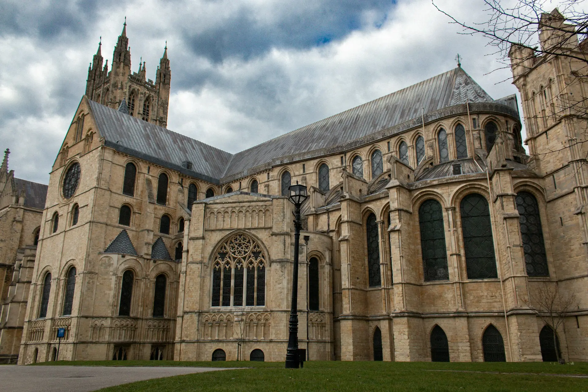 A beautiful cathedral stands beneath cloudy skies.