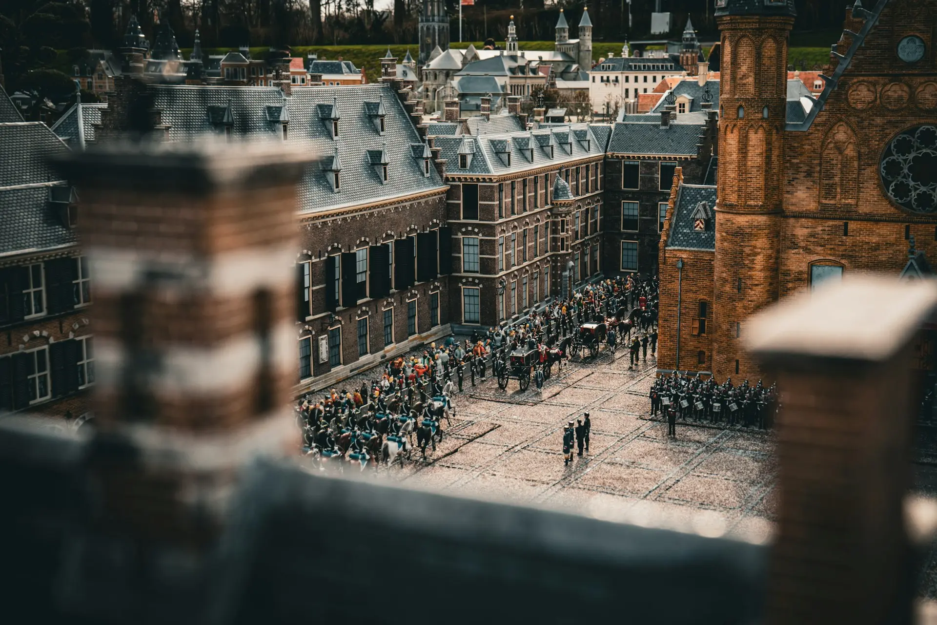 a group of people standing in front of a tall building