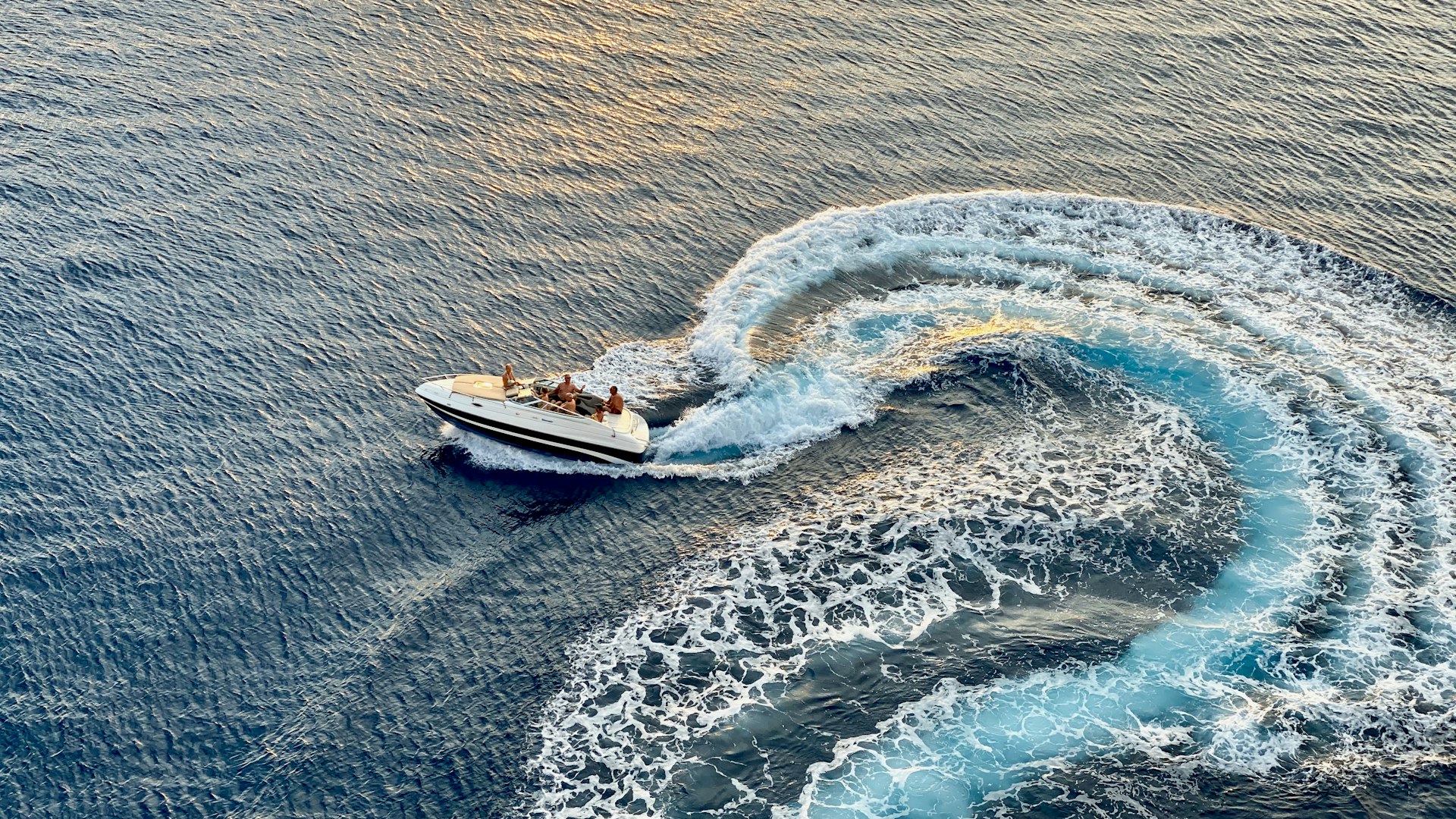 white yacht running on sea water