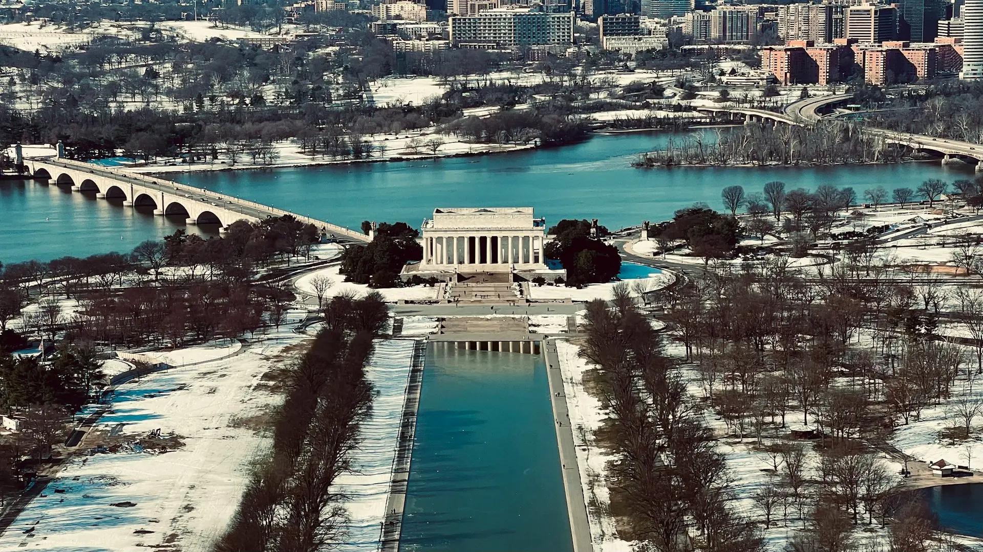 an aerial view of the lincoln memorial in winter