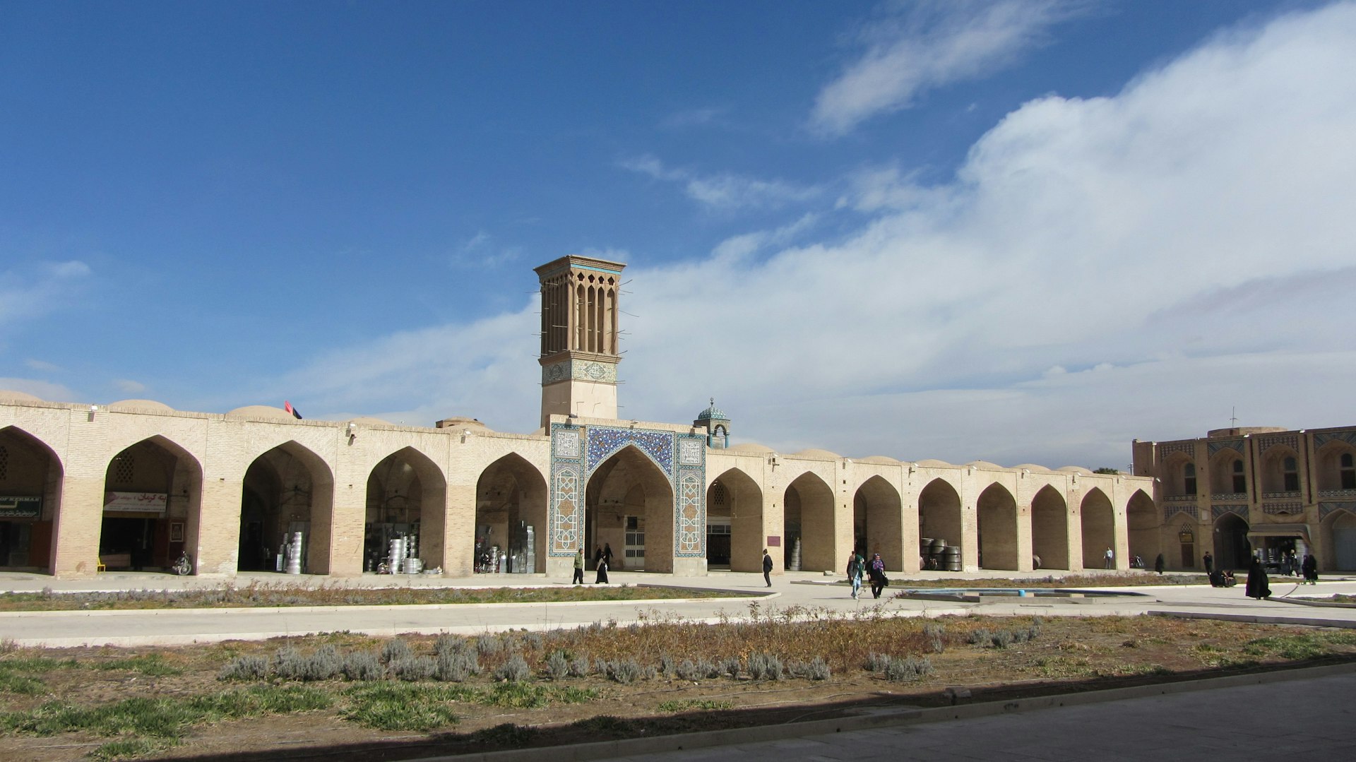 a large building with a clock tower in the middle of it