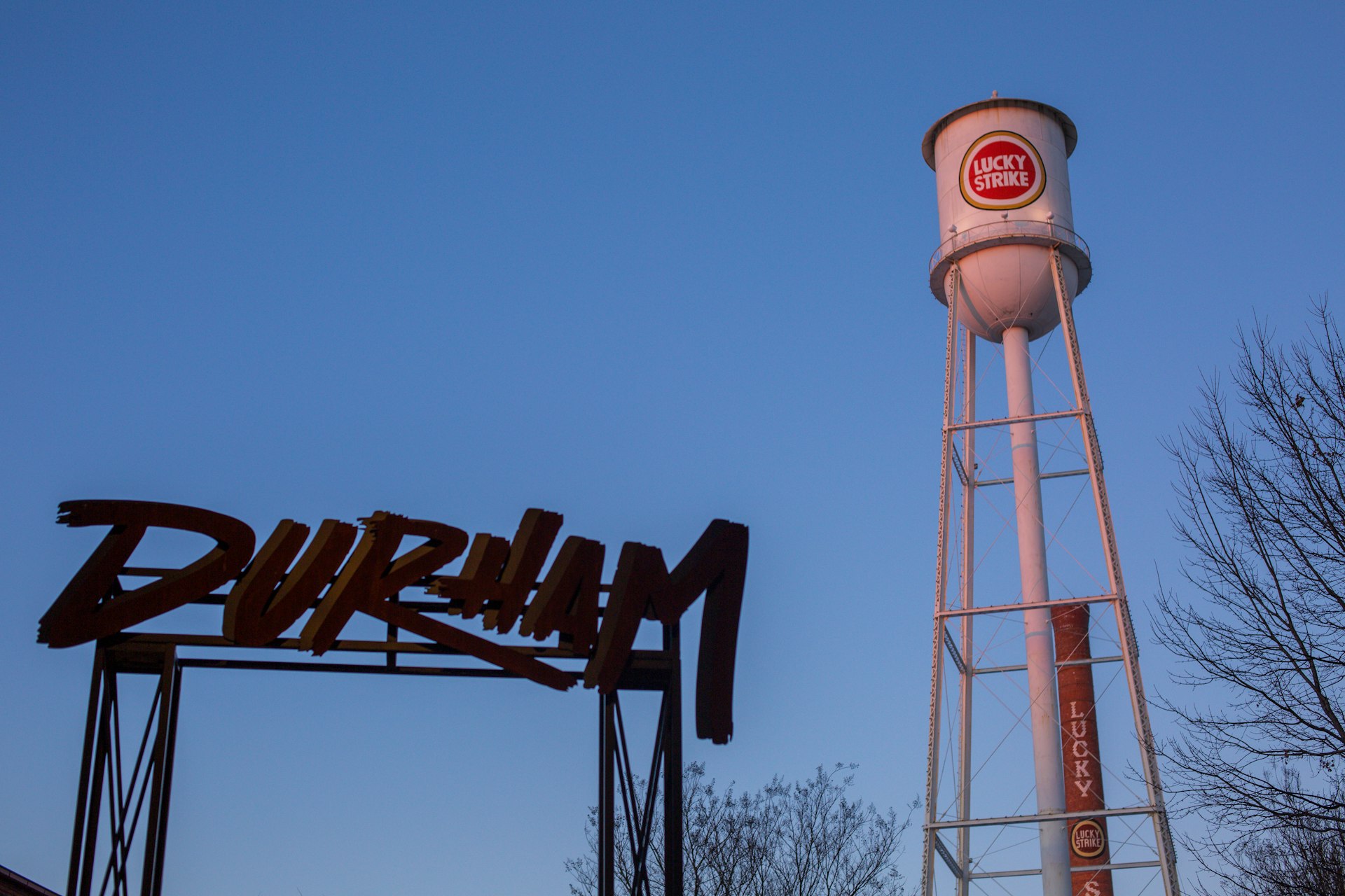 a water tower with a sign that says dunkin'donuts