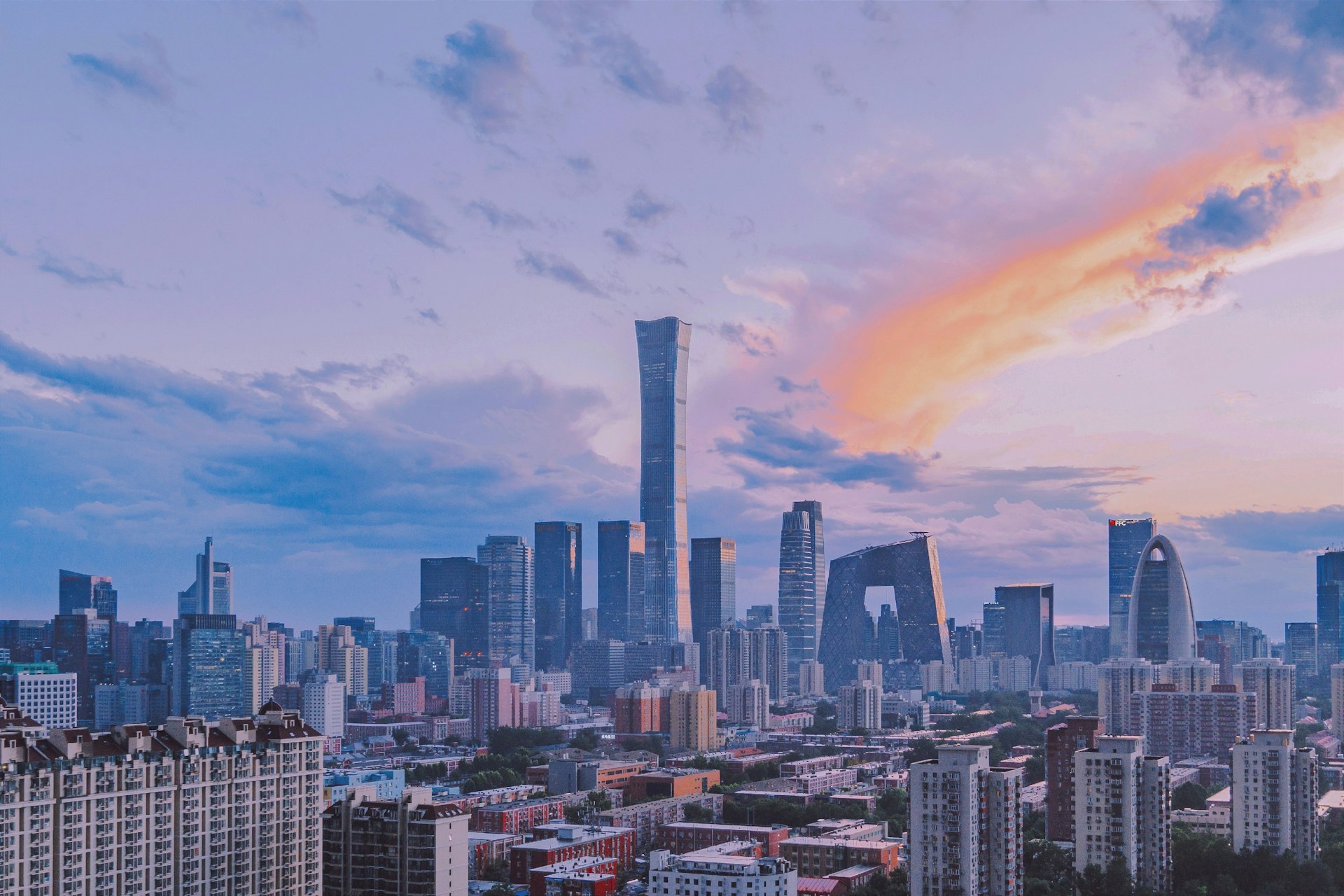 a view of a city with tall buildings
