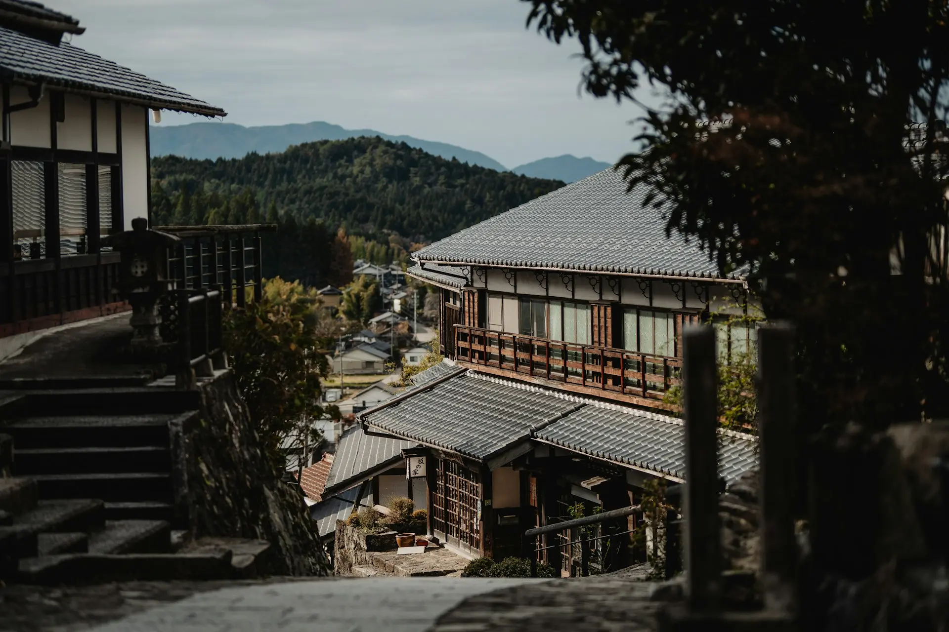A view of a building from the top of a hill