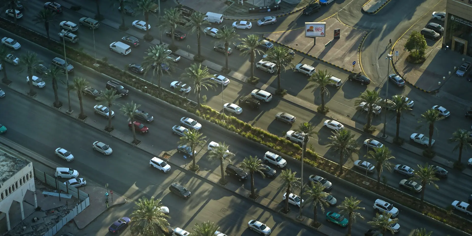 An aerial view of a parking lot in a city