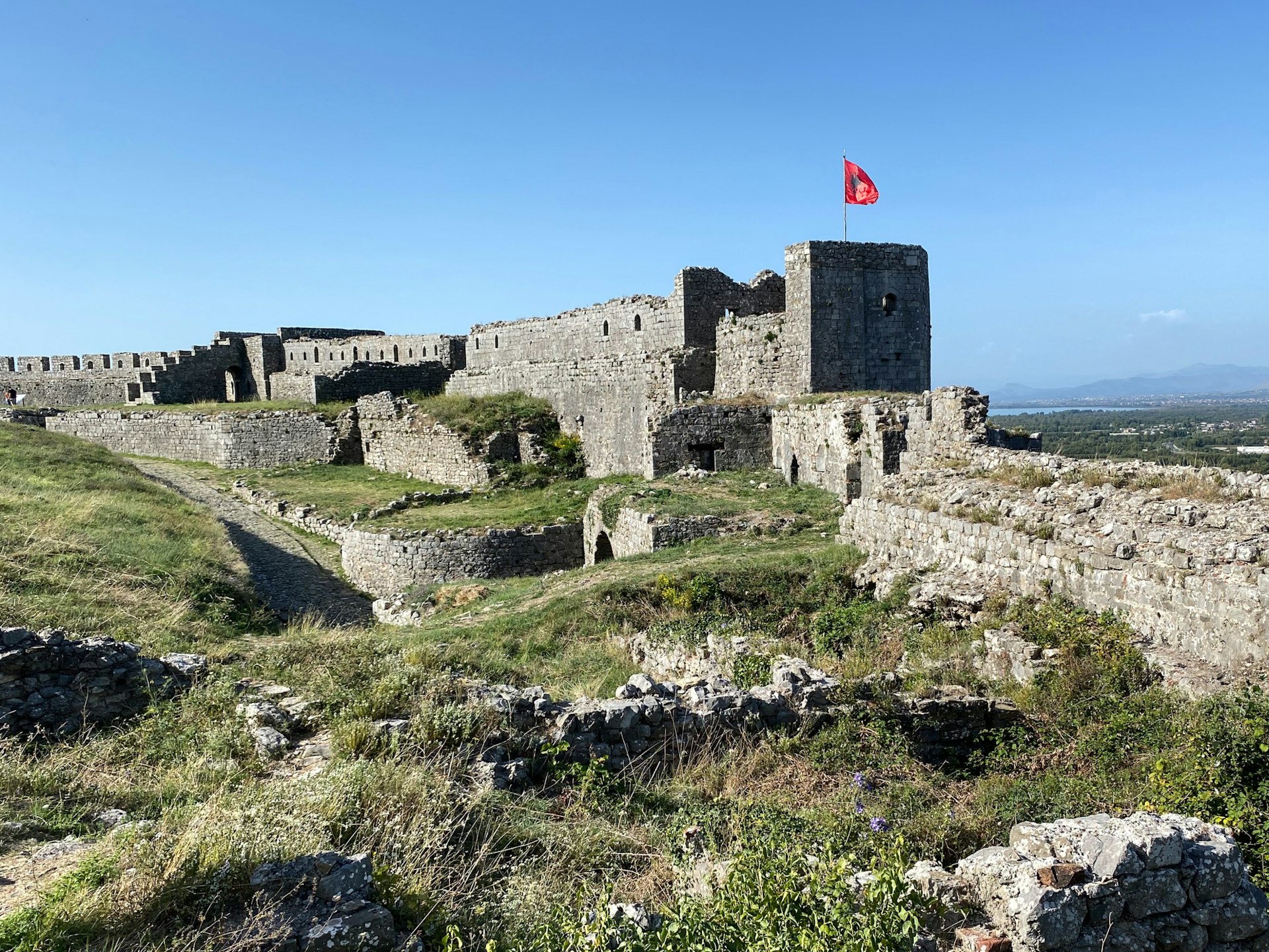 a castle with a flag on top of it