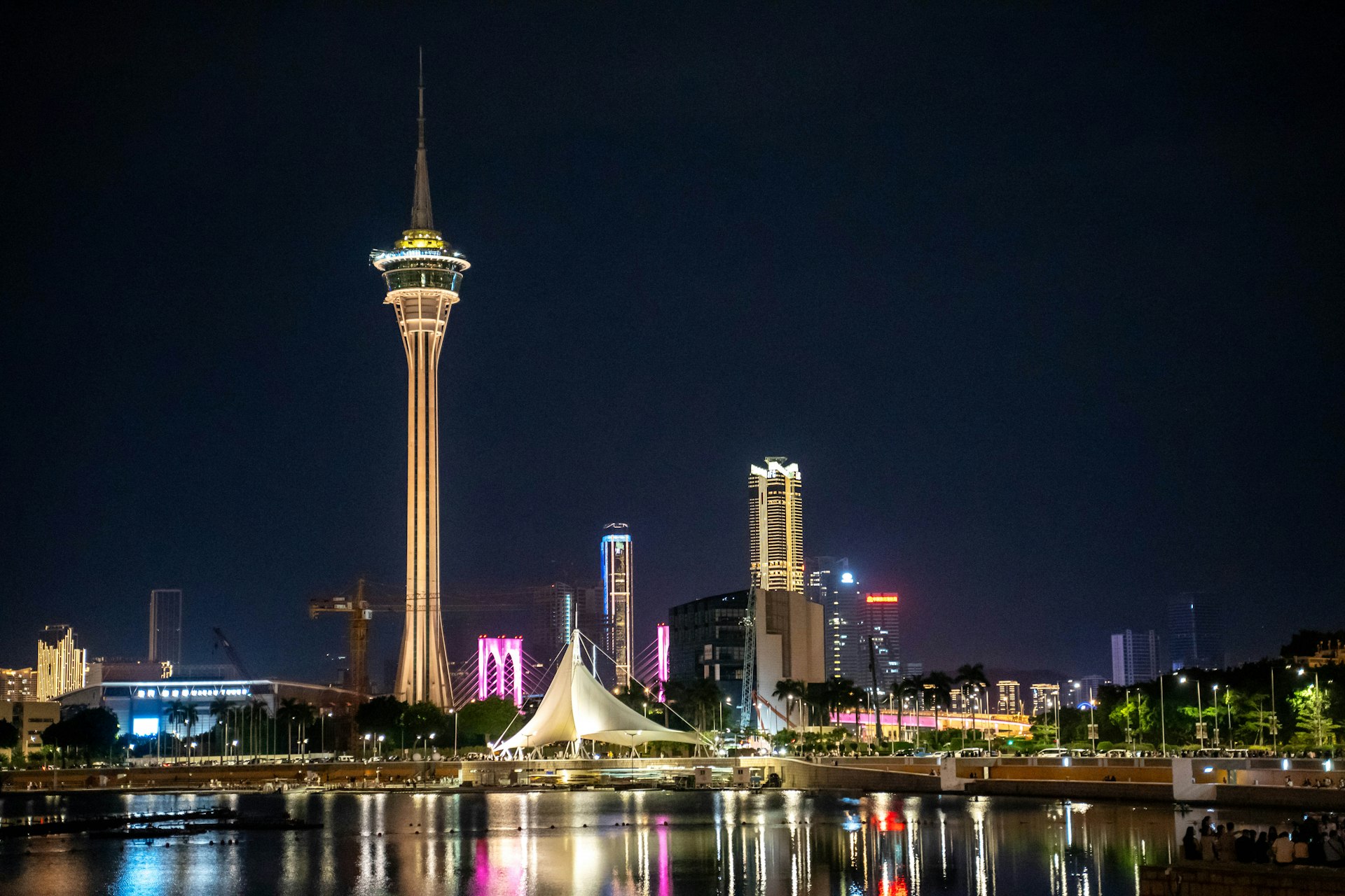 A view of a city at night from across the water