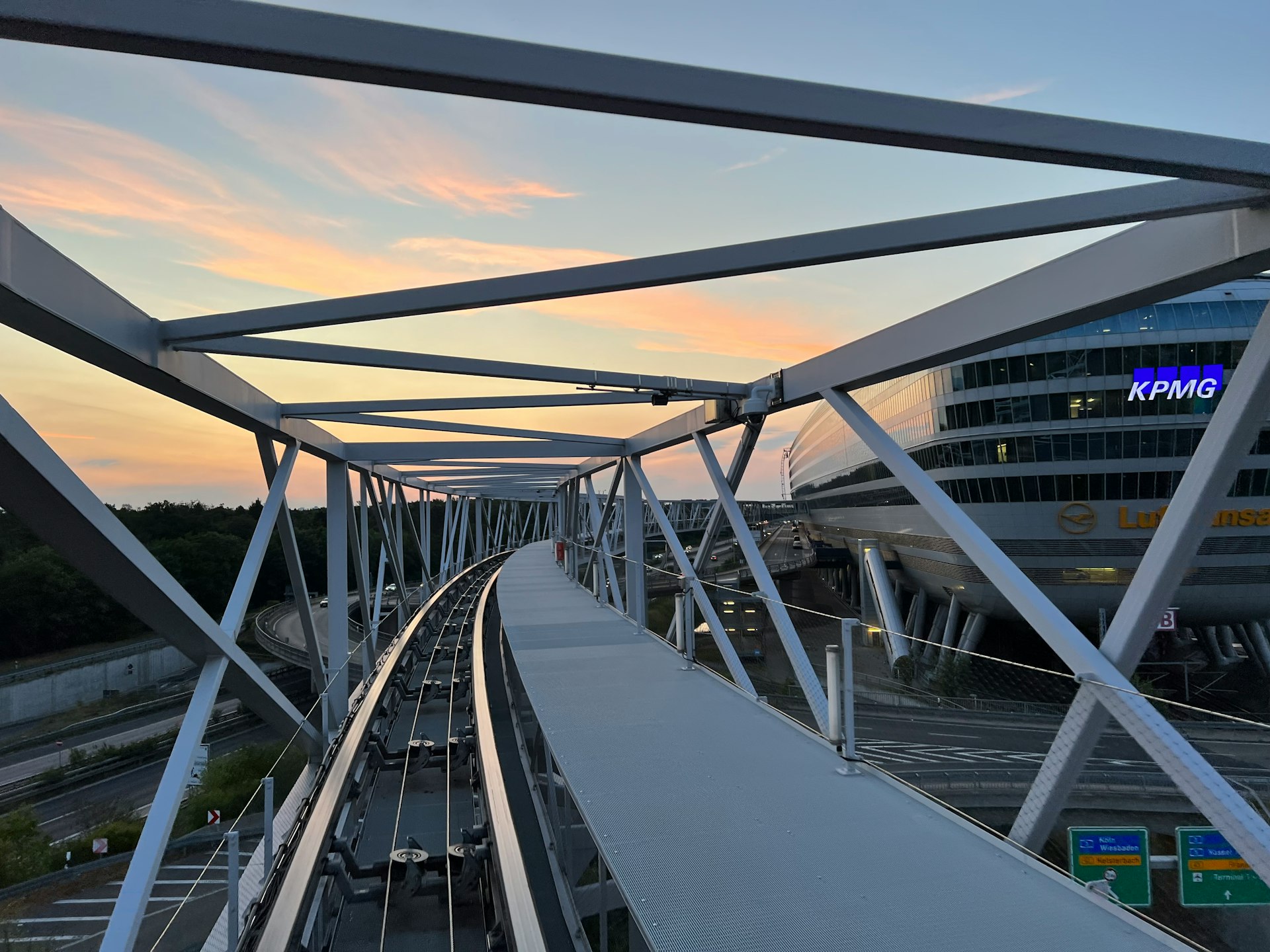 a bridge with a building in the background