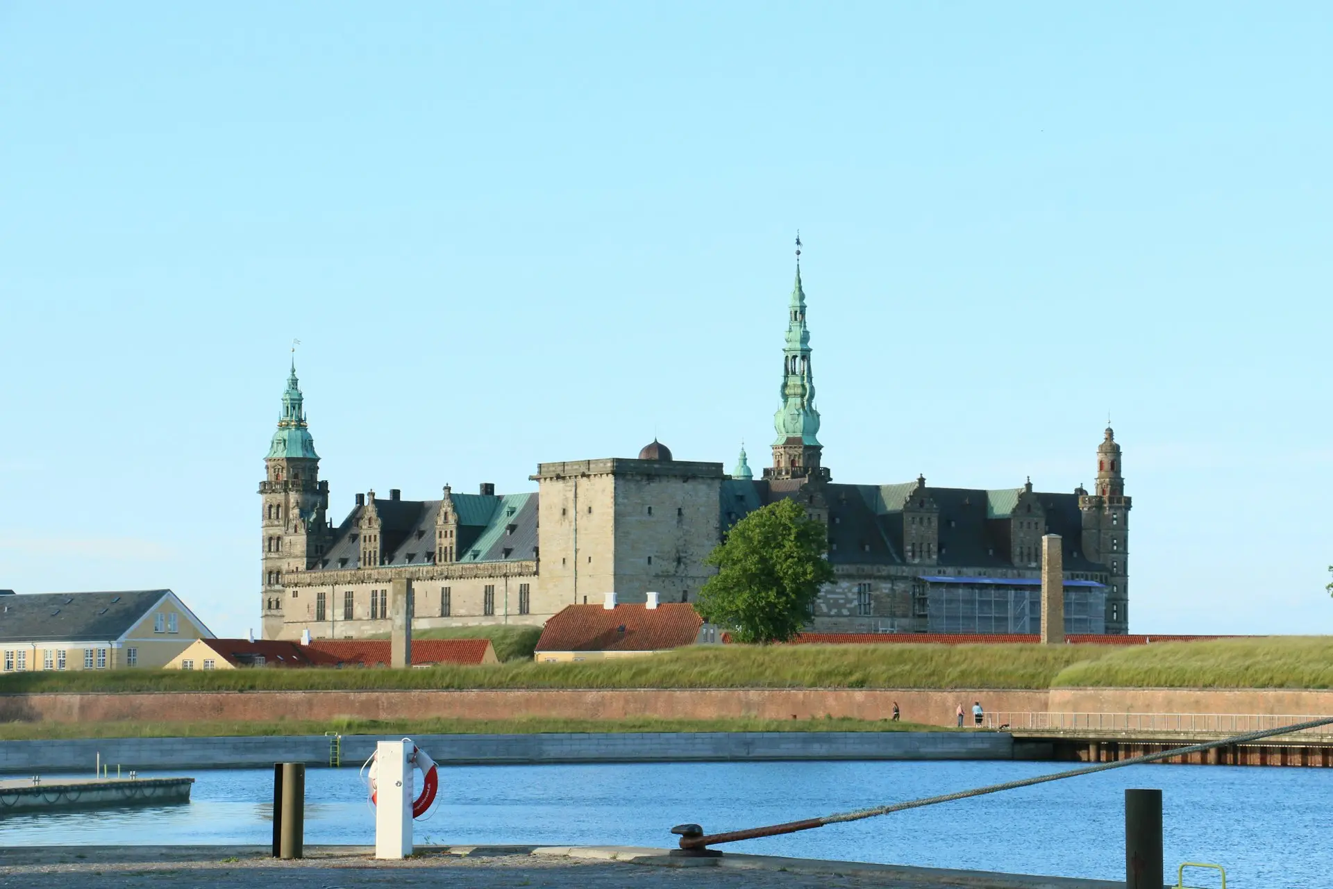 A majestic castle stands proudly by the water.