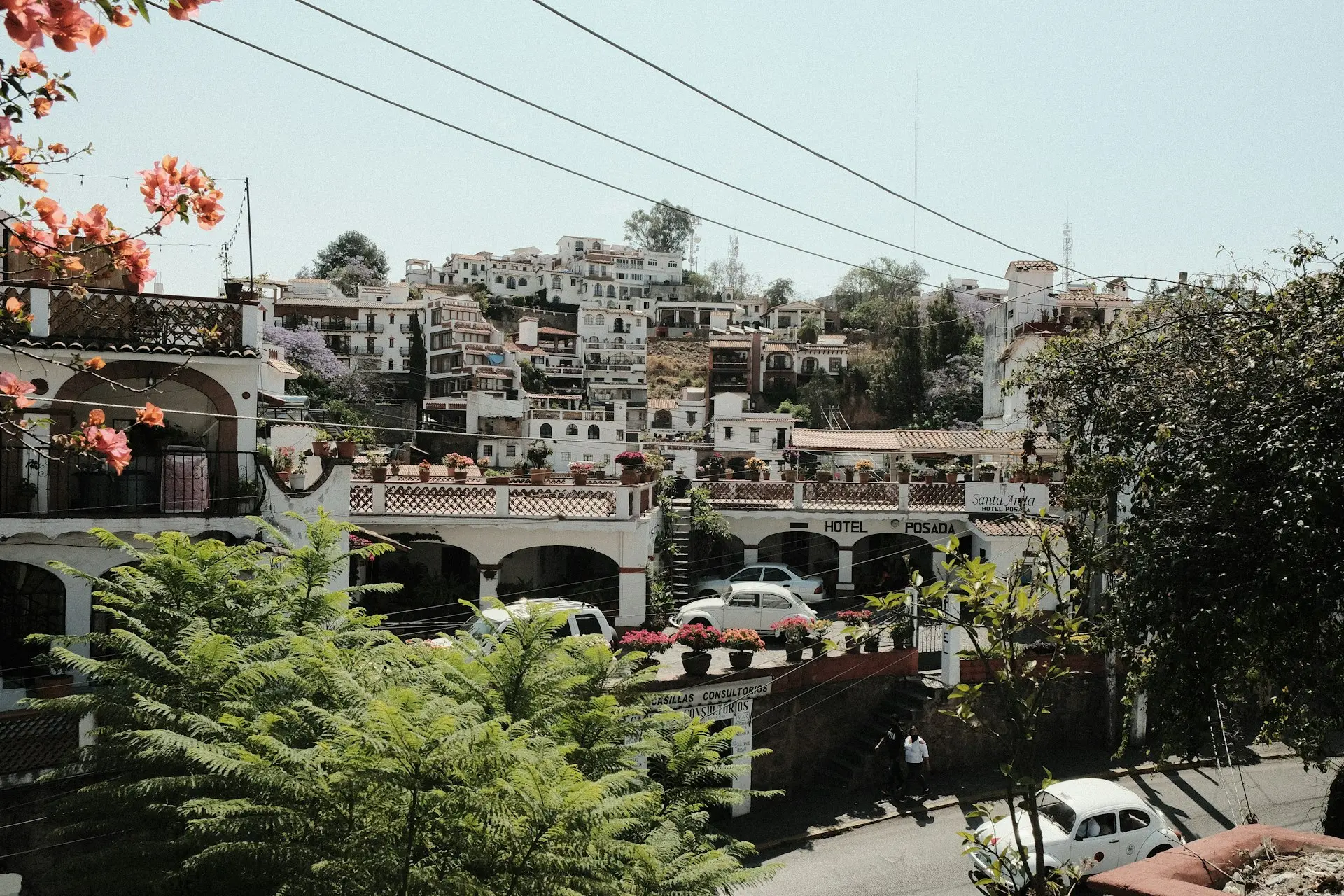 a view of a street with a bunch of buildings in the background