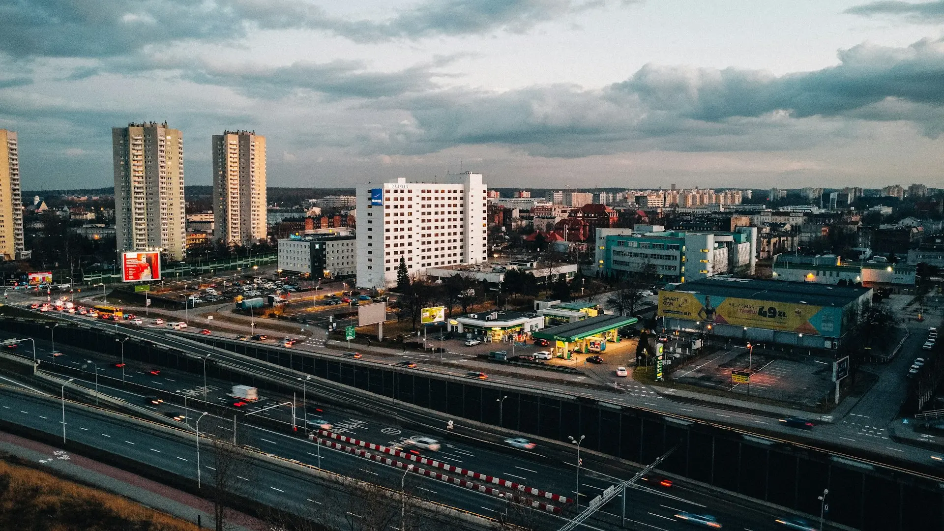 A view of a city from the top of a building