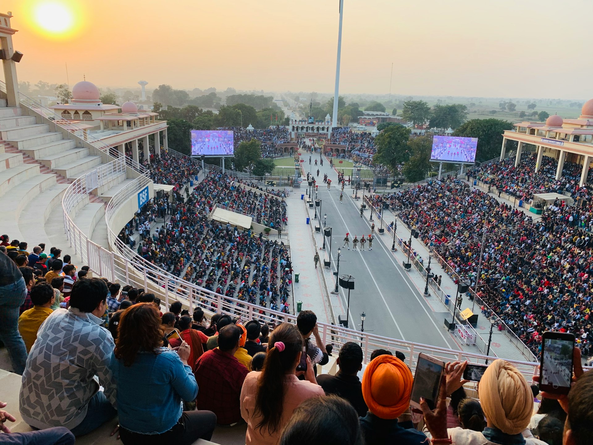 a crowd of people watching a race