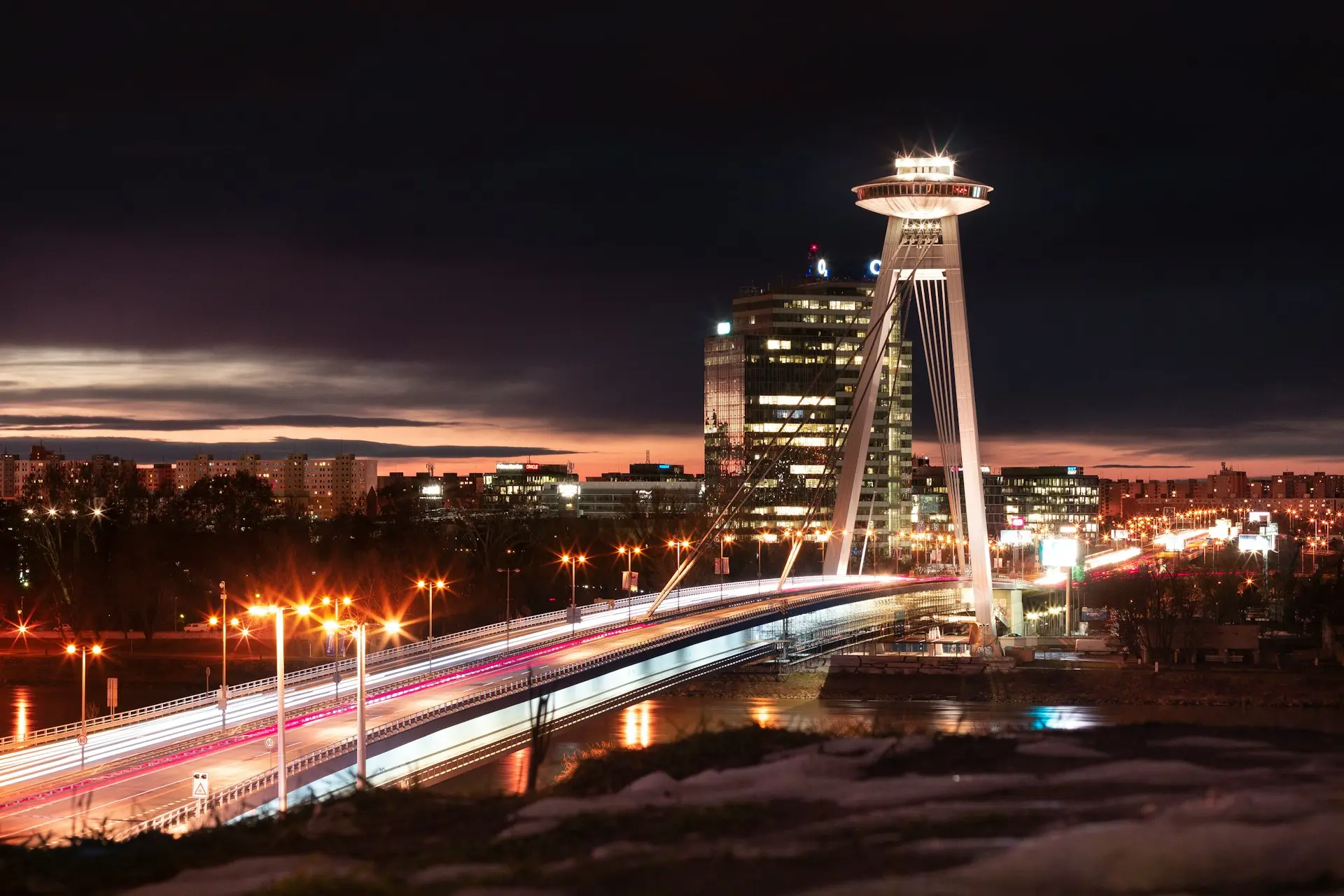 time lapse photography of city lights during night time