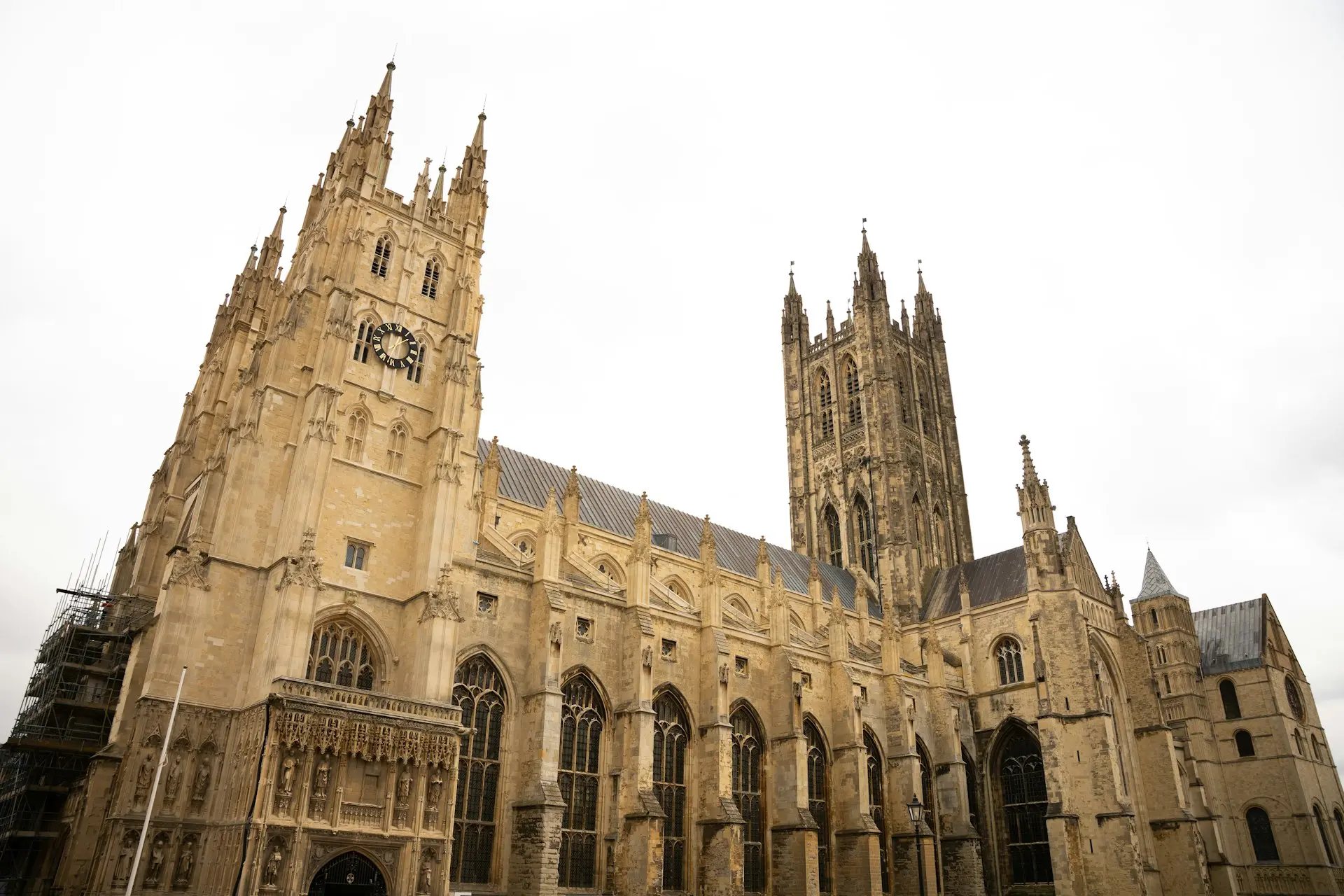 Here's a short caption: **a majestic cathedral stands tall against a cloudy sky.**