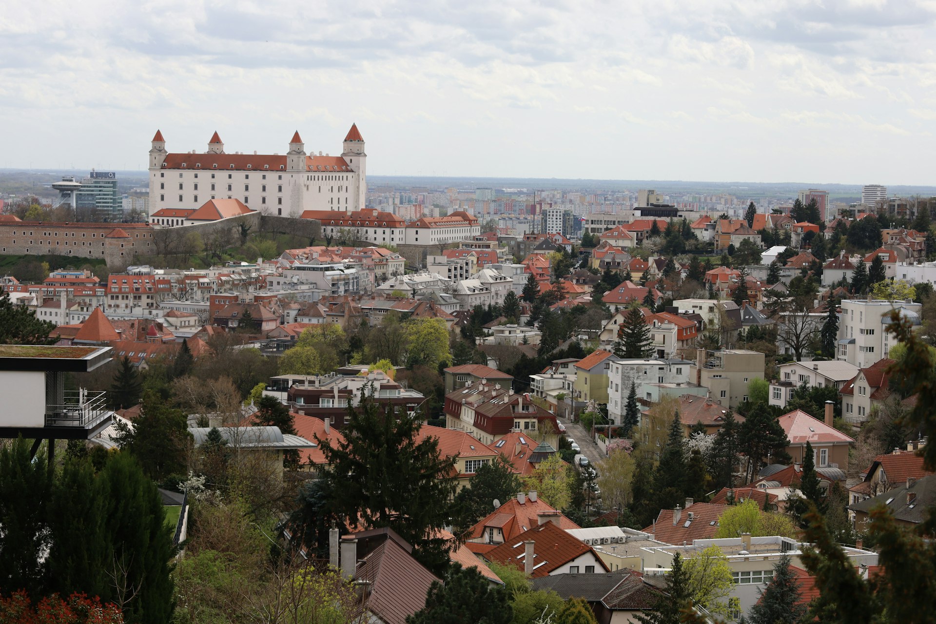 a view of a city from the top of a hill