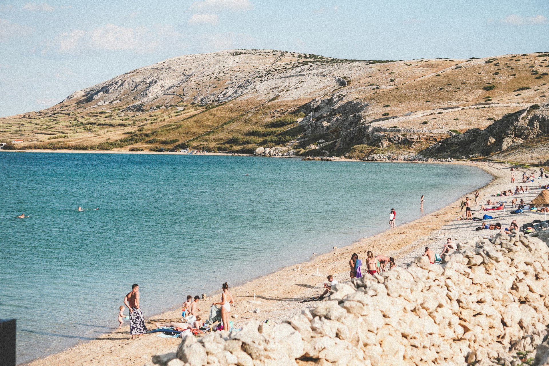 people on beach during daytime