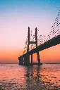unsplash_ZsgUsl8GATg_River with bridge .webp